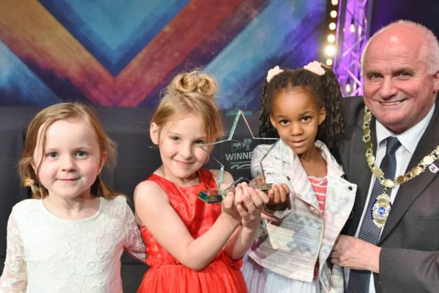 Peterborough City Council 2016 Children's Film Awards at the Kingsgate Centre. The Warwick Davis Award presented by Keith Sharp to Dogsthorpe Infants EMN-160629-090249009