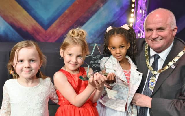 Peterborough City Council 2016 Children's Film Awards at the Kingsgate Centre. The Warwick Davis Award presented by Keith Sharp to Dogsthorpe Infants EMN-160629-090249009