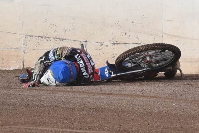 Simon Lambert after crashing against Somerset.