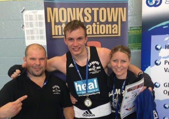 Artur Tomasevic with coaches Mark Dane and Vicki Baker.