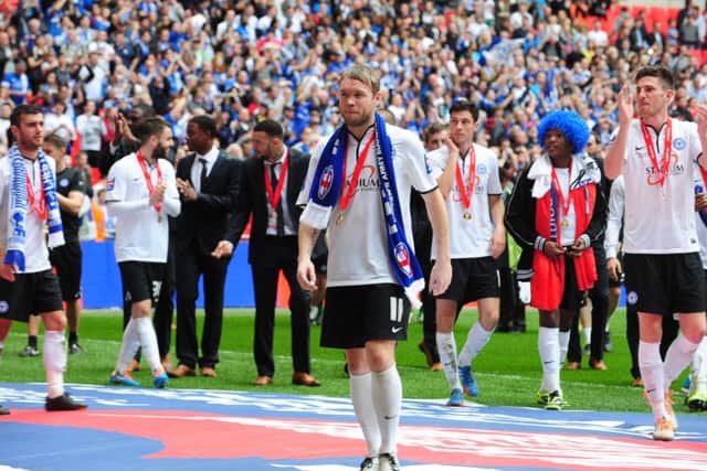 New Posh manager Grant McCann leads the celebrations after the JPT Final win at Wembley in 2014.