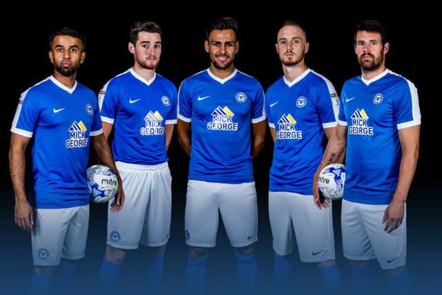 Posh players modelling the new 2016-17 home strip are: (from left) Adil Nabi, Jack Baldwin, Ryan Tafazolli, Marcus Maddison and Michael Bostwick. Photo: Joe Dent/theposh.com.