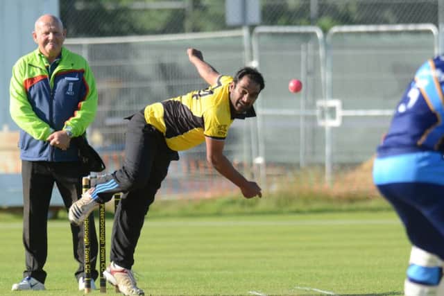 Balaji Ganesan bowls for Peterborough Town in the abandoned Jaidka Cup Final. Photo: David Lowndes.