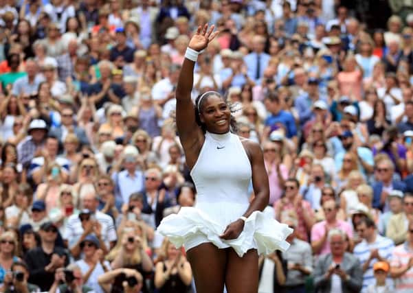 Serena Williams celebrates her latest Wimbledon success.