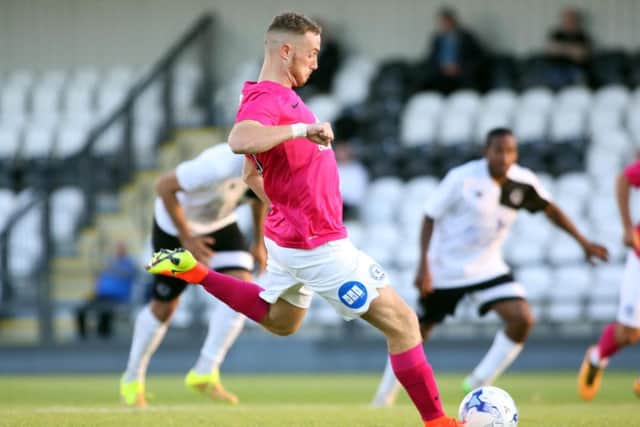 Marcus Maddison scores from the penalty sport for Posh at Boreham Wood. Photo: Joe Dent/theposh.com.
