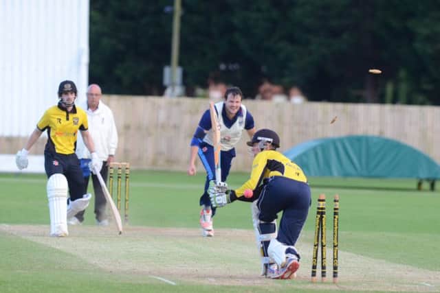Peterborough Town's Scott Howard is clean bowled by Colin Cheer of Bourne.