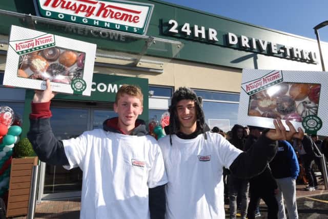 Oliver Cullen and Samuel Coward at the opening of Krispy Kreme Doughnuts in Hampton this morning