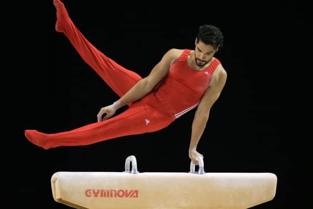 Louis Smith in action on the pommel horse for Great Britain.