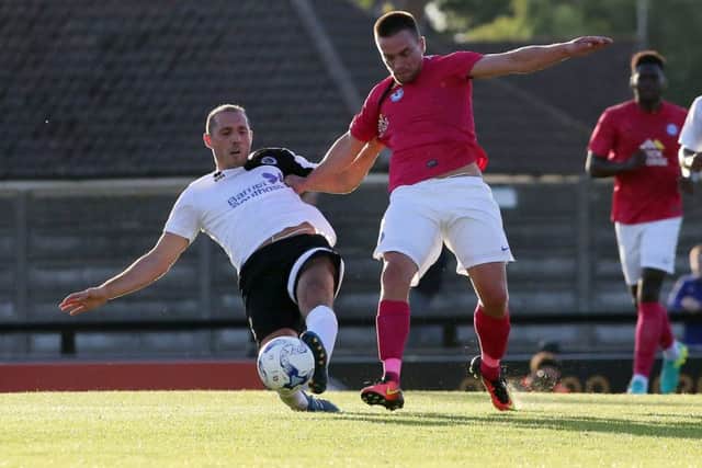 Paul Taylor in action for Posh at Boreham Wood.