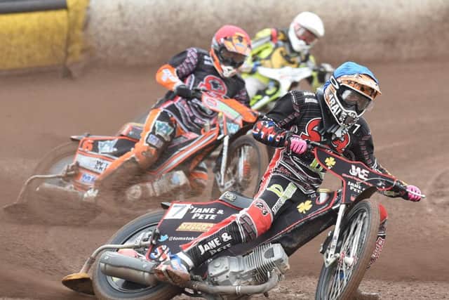 Ashley Morris (red) and Tom Stokes (blue) on the way to a 5-1 for Panthers in heat two v Berwick at Alwalton. Photo: David Lowndes.