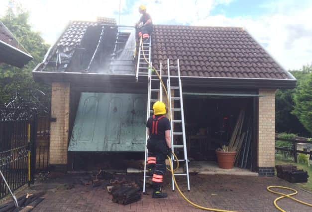 Fire crews tackling the garage fire