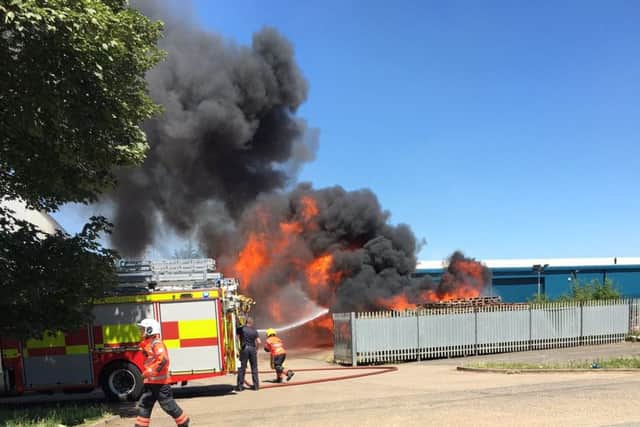Firefighters tackle the blaze. Pic: Lewis McManus