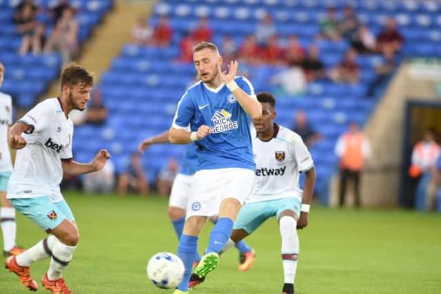Posh star Marcus Maddison in action against West Ham. Photo: David Lowndes.