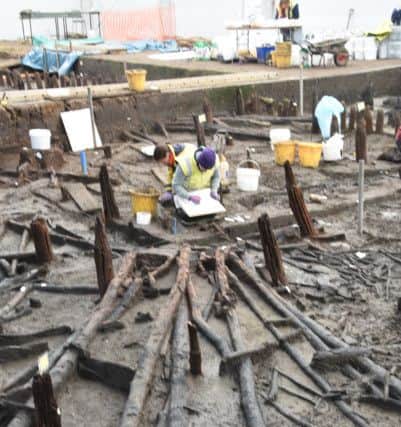 Bronze Age wheel found at Must Farm archaeological dig at Kings Dyke. EMN-160218-132641009