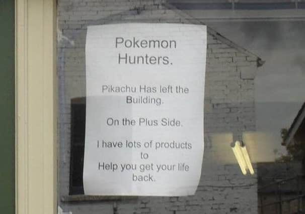 Phil's Mart, in Whittlesey, Peterborough where a sign was put up to deter players of Pokemon Go - and help them get their "lives back". QhrQmgKV5g7K1G5SI3Zy