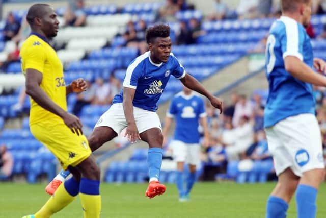 Posh striker Shaquile Coulthirst scores his first goal of the game against Leeds. Photo: Joe Dent/theposh.com.