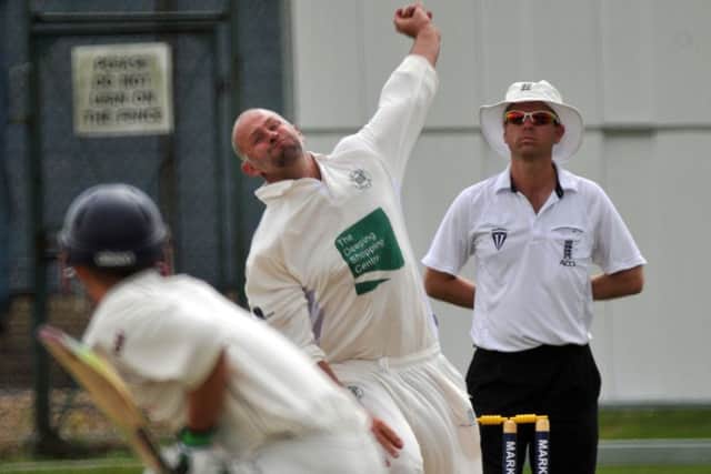 Lee Peacock bowling for Market Deeping v Skegness. Photo: Tim Wilson.