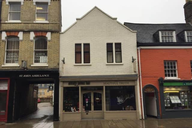 The premises, centre, in Cowgate, Peterborough, which have just been bought by The Beautiful Truth.