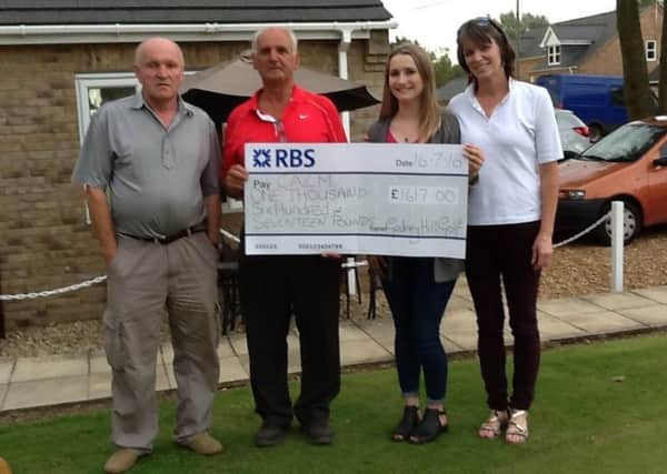 A total of Â£1,617 was raised for the charity CALM (Campaign Against Living Miserably) when Gedney Hill Golf Club held their joint Captains Day.  Pictured at the event are from the left Charles Britton (owner), Colin Rust (club captain), Colins grand-daughter Tylia and Lynn Exley (lady captain). Tylia had already raised over Â£600 by doing a parachute jump.