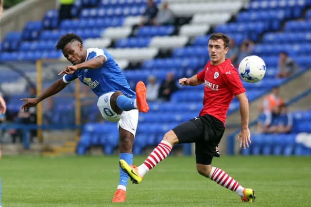 Posh striker Shaquile Coulthirst shoots at goal in the friendly with Barnsley at the ABAX Stadium. Photo: Joe Dent/theposh.com.