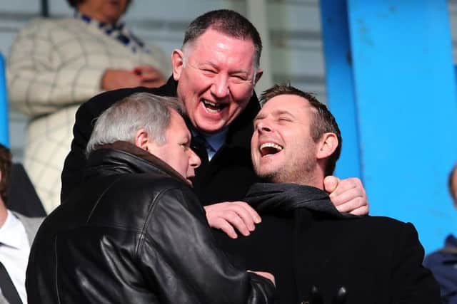 Posh chairman Darragh MacAnthony (right) shares a joke with director of football Barry Fry (left) and chief executive officer Bob Symns. Photo: Joe Dent/theposh.com.