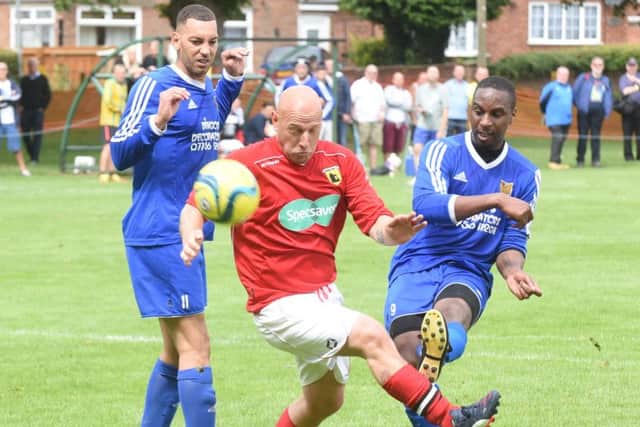 Action from Crowland v Stanground in ground hop weekend. Photo: David Lowndes.