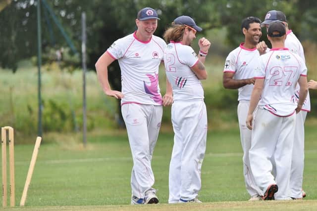 Ketton celebrate a wicket in their 10-wicket success at Newborough. Photo: David Lowndes.