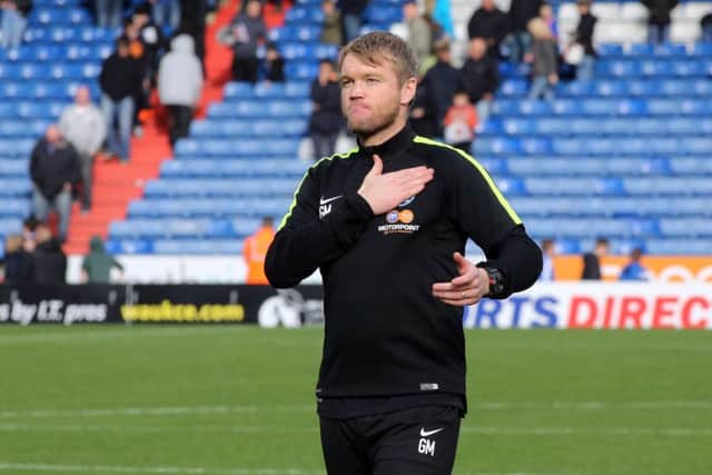 Grant McCann celebrates a win when caretaker-manager at Posh last season. Photo: Joe Dent/theposh.com.
