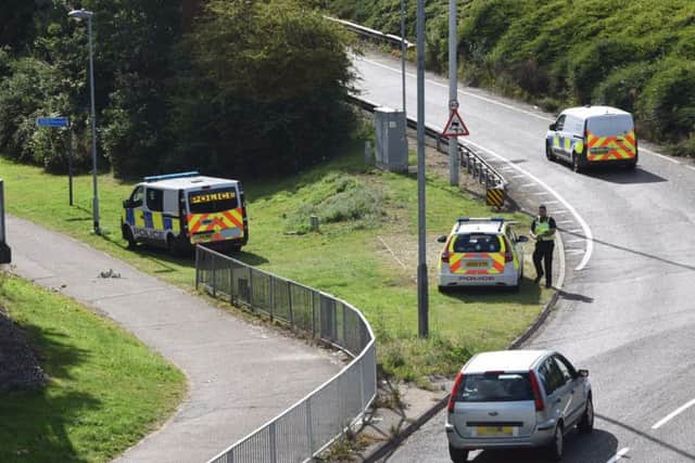 Police attending to the sudden death in Maskew Avenue today - Photo: David Lowndes