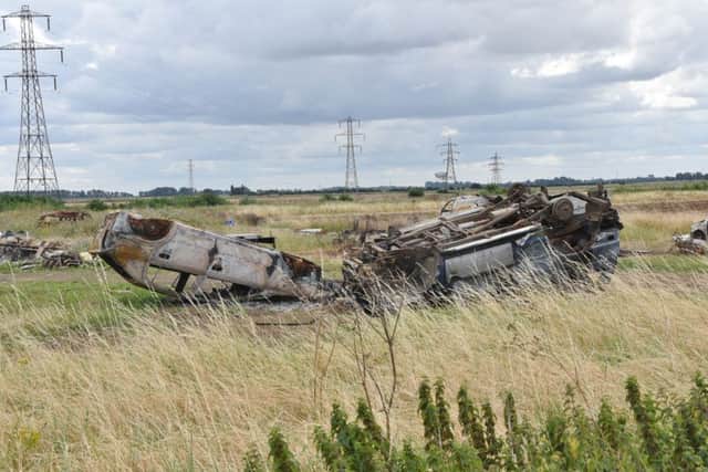 Burnt out cars at Oxney Road