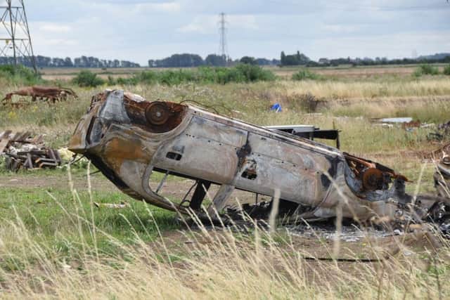 Burnt out cars at Oxney Road EMN-160408-193004009