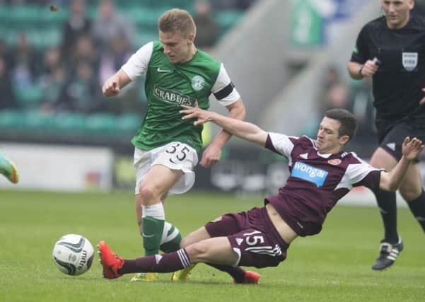 Jason Cummings in action for Hibs.