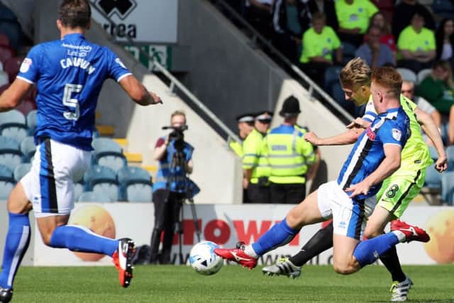 Chris Forrester scores for Posh at Rochdale. Photo: Joe Dent/theposh.com.