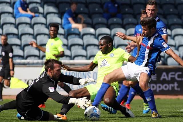 Posh full-back Hayden White just failed to get on the end of this Shaquile Coulthirst cross at Rochdale. Photo: Joe Dent/theposh.com.