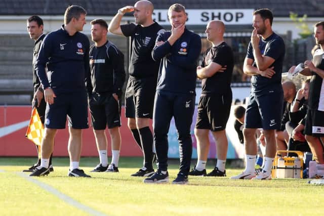 The Posh management team were happy with the win at Rochdale.
