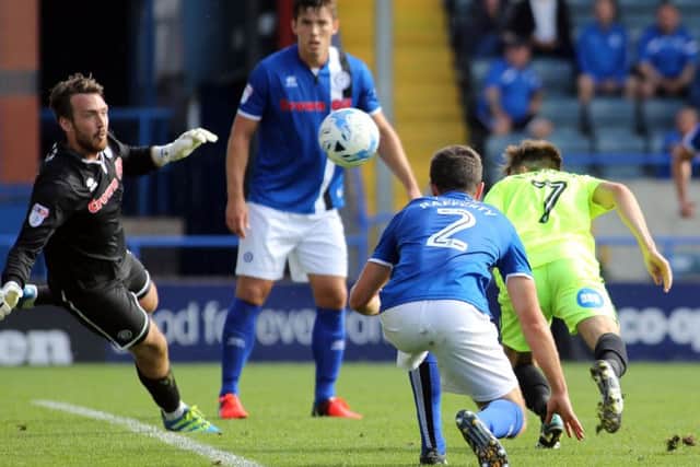Posh substitute Gwion Edwards heads the winning goal against Rochdale. Photo: Joe Dent/theposh.com.