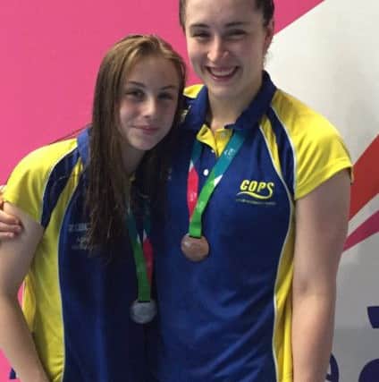 COPS medal winners Amelia Monaghan and Becky Burton.