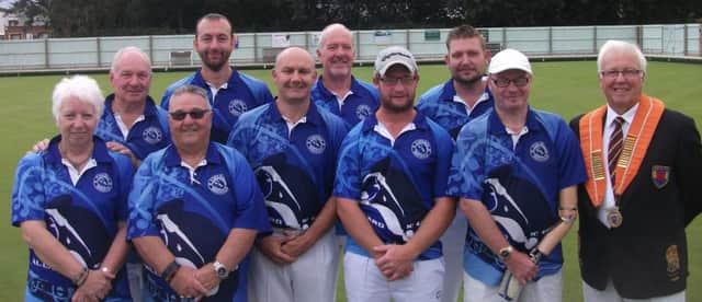 Pictured are Parkway, winners of the Northants Bowling Federations Adams Cup, with county president Bob Warters. Left to right are Pat Reynolds, Stuart Reynolds, Fred Addy, Neil Wright, Brian Martin, Tony Scarr, Tristan Morton, Simon Law, Mike Robertson and Bob Warters.