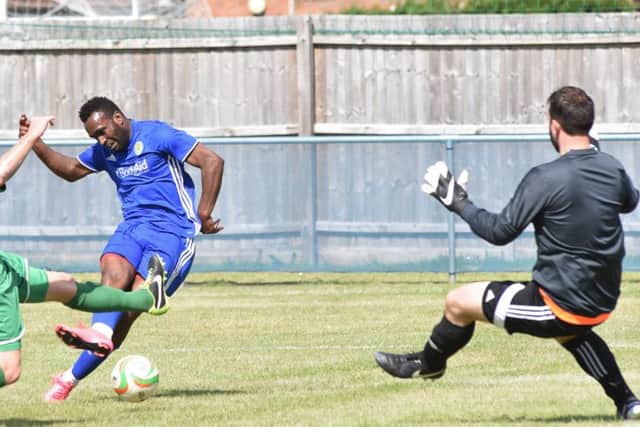 Star striker Avelino Vieira scores for Peterborough Sports against Gorleston. Photo: David Lowndes.