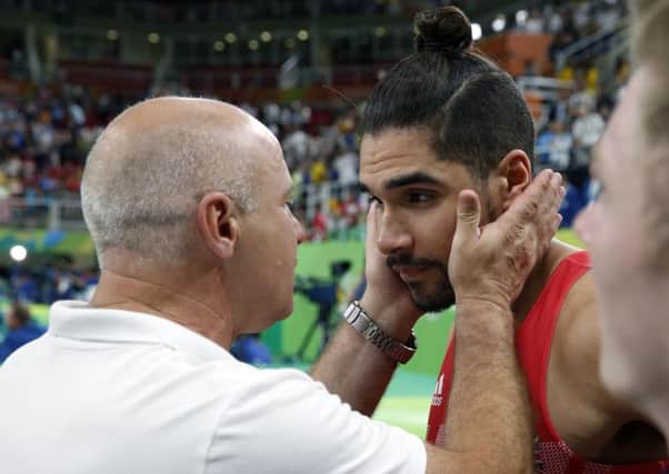 Louis Smith looks dejected following his pommel horse routine in Rio last night. Picture: Owen Humphreys/PA Wire.