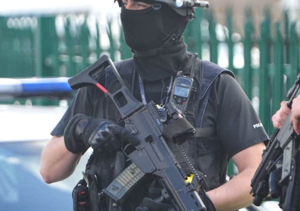 An armed Cambridgeshire Police officer ENGEMN00120120917131555