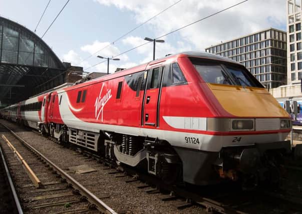 Staff with Virgin Trains East Coast have voted for strike action in protest at what unions say is a threat to jobs.