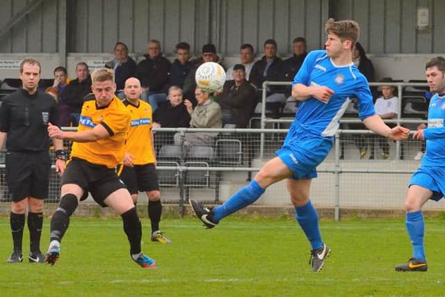 Tommy Treacher (left) scored for Holbeach at Yaxley.