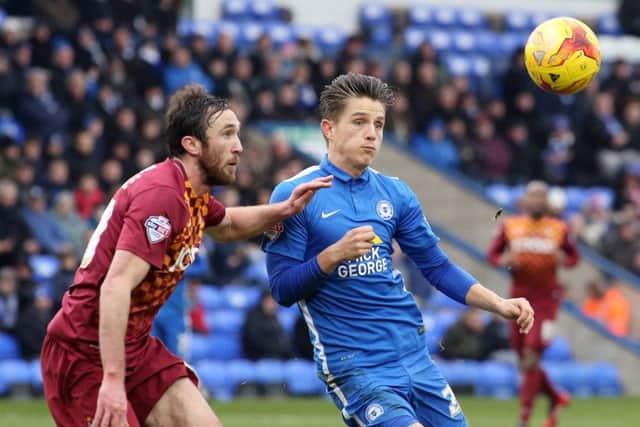Tom Nichols in action for Posh against Bradford City in last season's League One fixture at the ABAX Stadium.