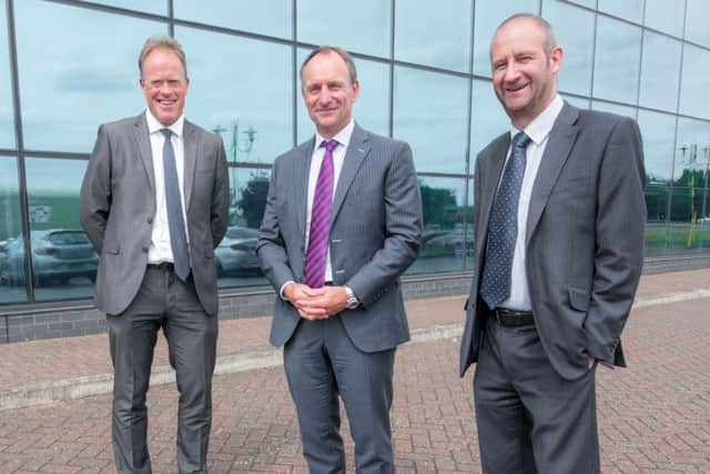 DEAL: from left, Simon Moore, head of Yorkshire Banks Customer Banking Centre in Peterborough, Rob Facer, owner and chairman of Barnack Estates UK, and Steve Woods, relationship manager at Yorkshire Banks Customer Banking Centre.
