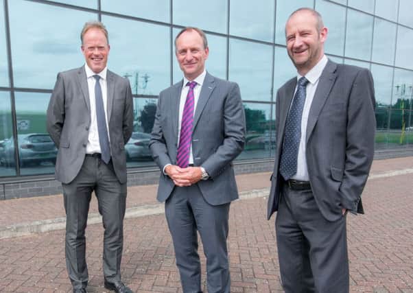 DEAL: from left, Simon Moore, head of Yorkshire Banks Customer Banking Centre in Peterborough, Rob Facer, owner and chairman of Barnack Estates UK, and Steve Woods, relationship manager at Yorkshire Banks Customer Banking Centre.