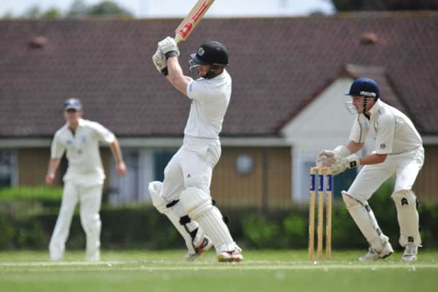 Alex Mitchell hits out for Petreborough Town against Rushden on his way to 45 from 37 balls. Photo: Chris Lowndes.