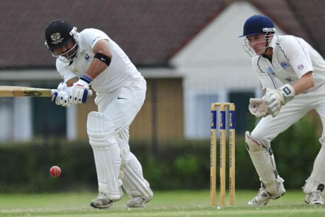 Asim Butt during his innings of 56 for Peterborough Town against Rushden. Photo: Chris Lowndes.