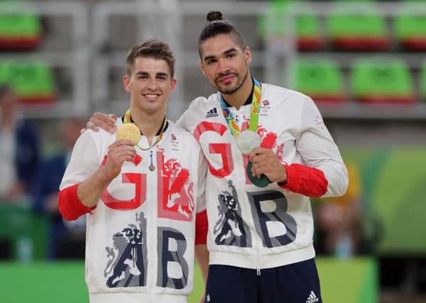 Great Britain's medallists Max Whitlock (left, gold) and Louis Smith (right, silver) following the men's pommel horse final.