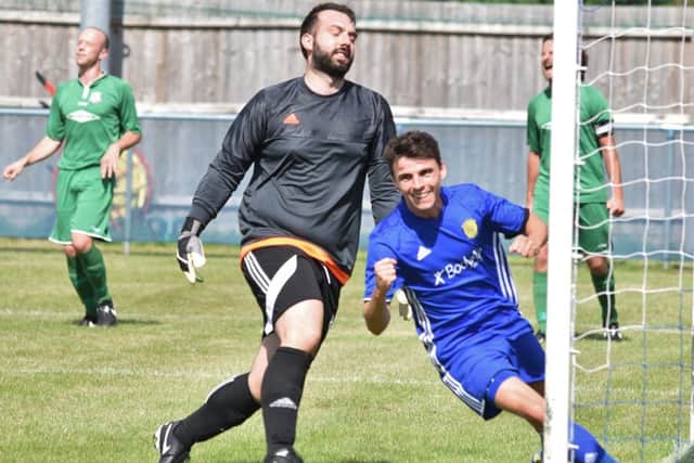 Dan Clements celebrates an FA Cup goal for Peterborough Sports against Gorleston earlier this month. Photo: David Lowndes.